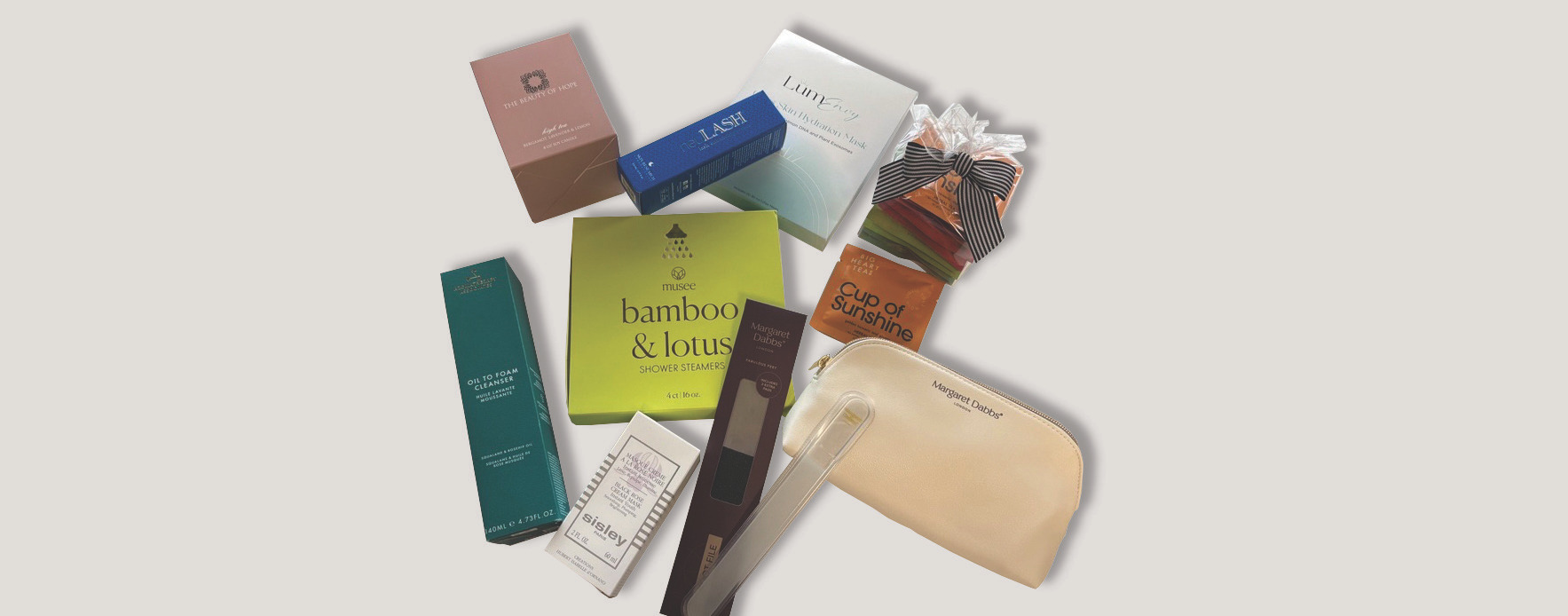 A collection of luxury spa and skincare products included in the Spring Reveal Box