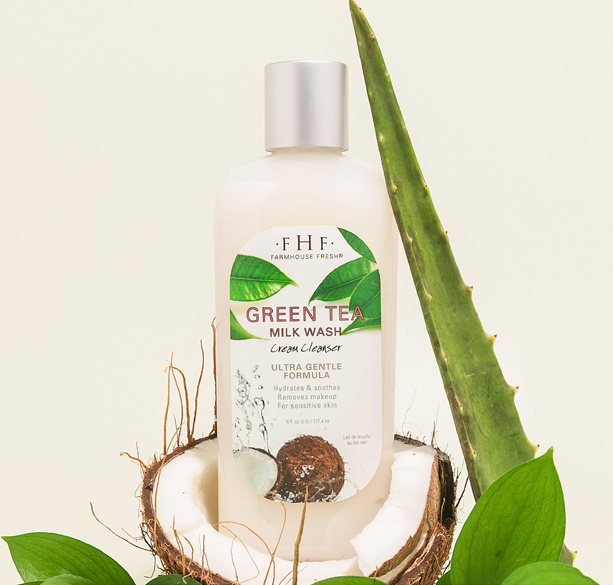 White pump bottle with coconut and aloe accents, product still life