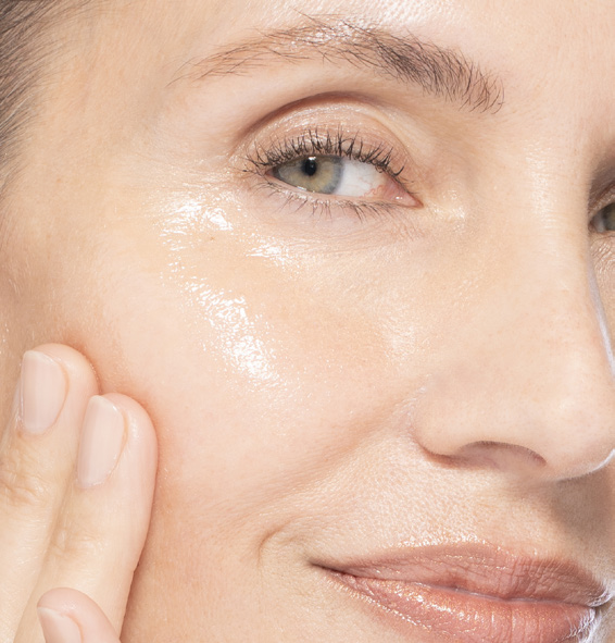 Close-up of woman's face with glossy skin