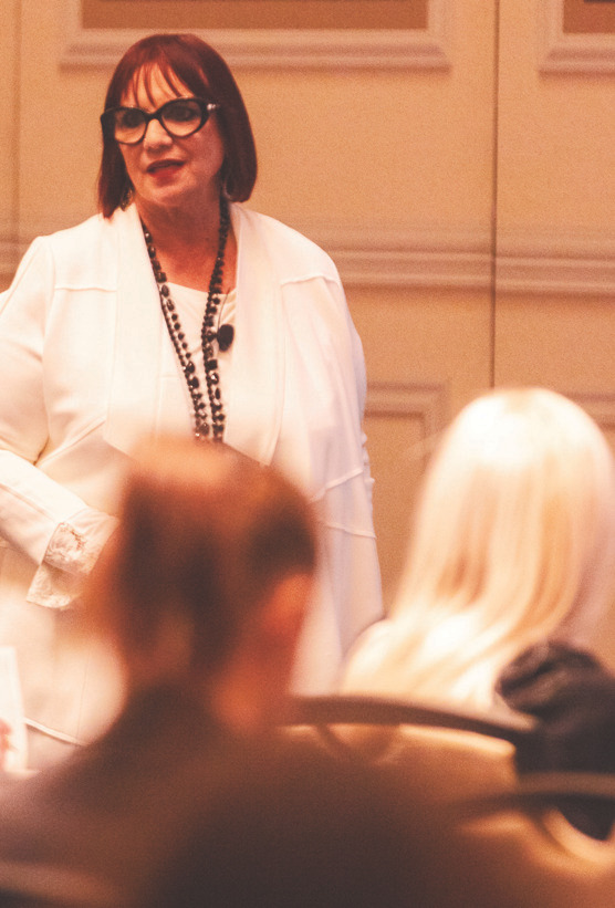 Carol Phillips presenting to an audience