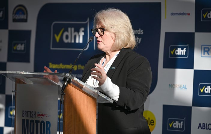 Patricia Sowsbery-Stevens speaking at a DHF podium