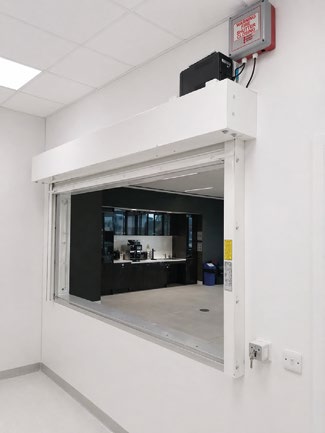 White internal service hatch with roller shutter in open position