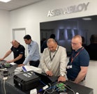 Partners inspecting equipment together during a training session