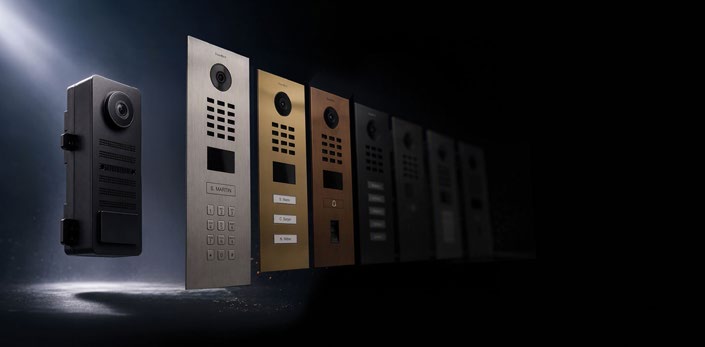 Row of DoorBird D22x intercom units in various finishes, hero product image