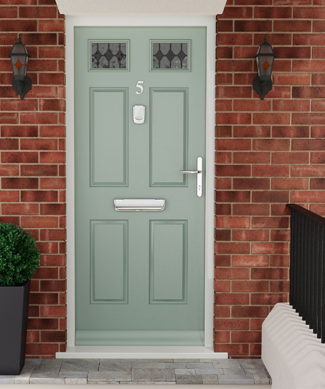 Mint-green front door with chrome handle, letterplate and knocker set in a brick entrance