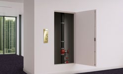 RISER-DOR doorset panel opened to reveal an internal shaft in a modern interior
