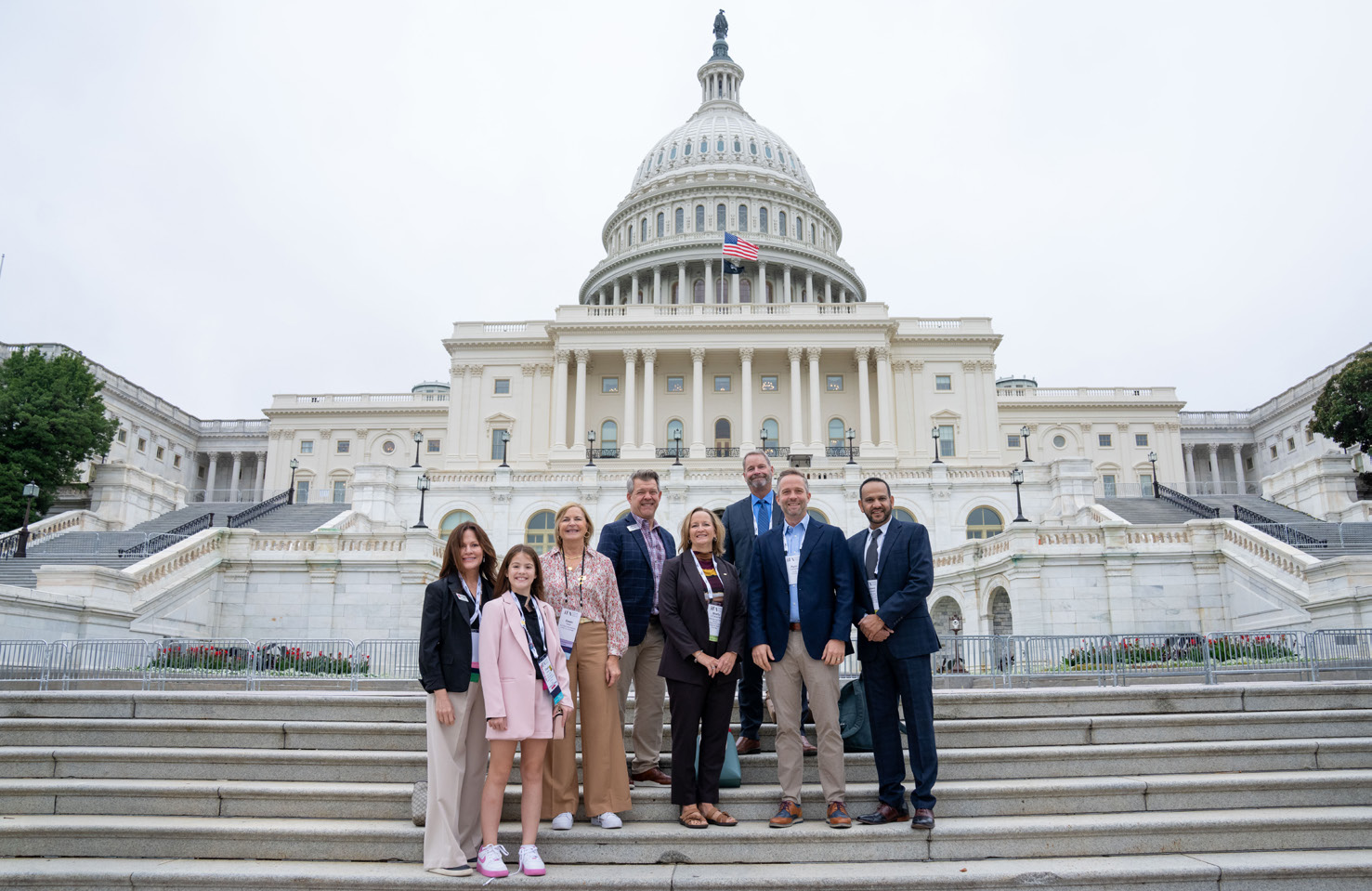 Large group photo of franchise advocates on the steps of the U.S. Capitol