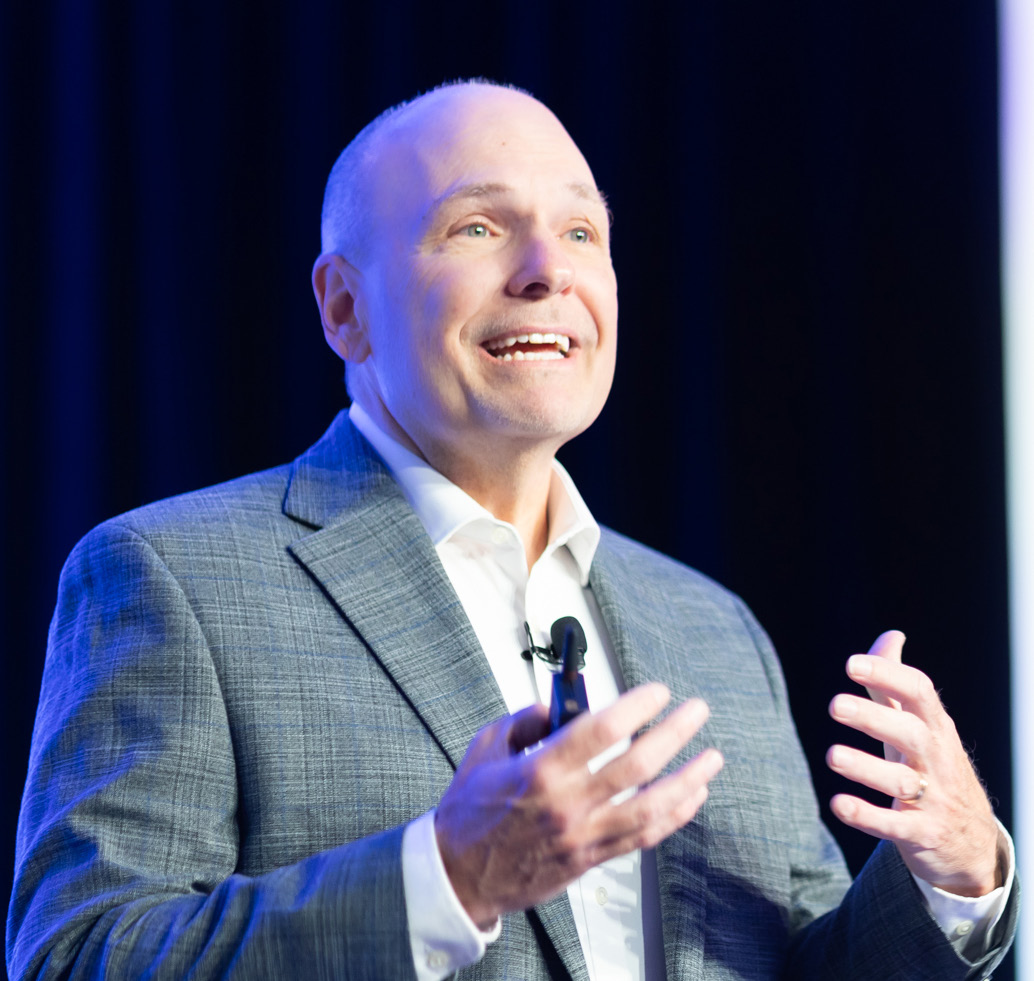 Executive speaker addressing the audience at FLDC